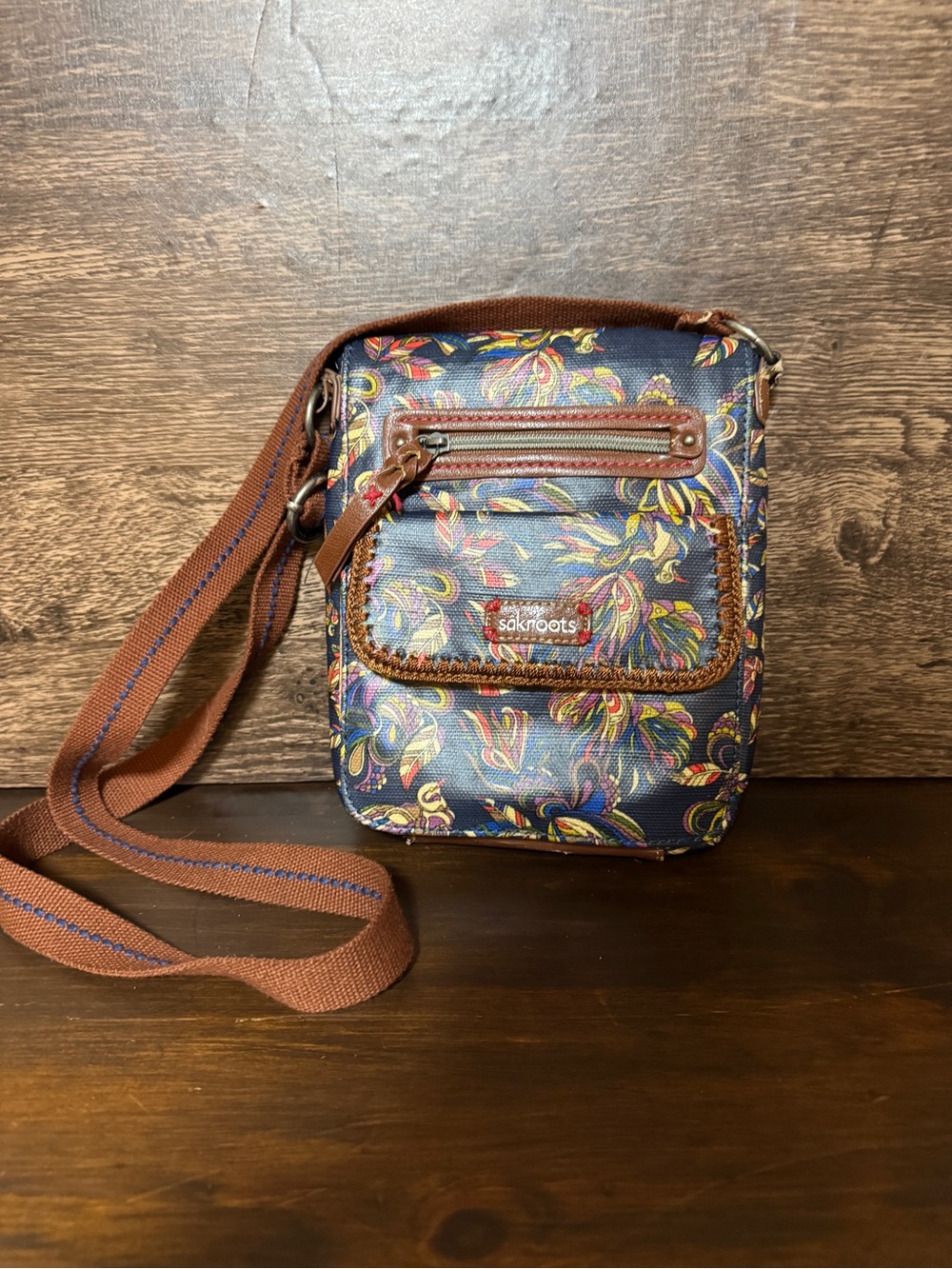Sakroots Small Navy Floral Crossbody Bag with Brown Strap